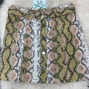 Snake print mini skirt.